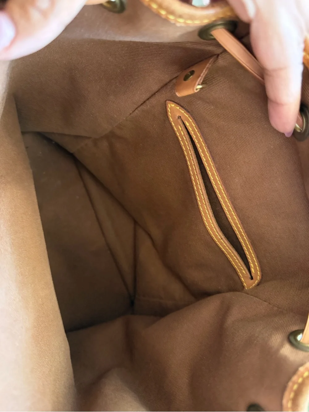 Louis Vuitton Monogram Canvas Drawstring Backpack with Tan Trim